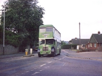 Wootton High St. Junction with Station Rd. Bus route No. 1A and no traffic lights etc, 1981