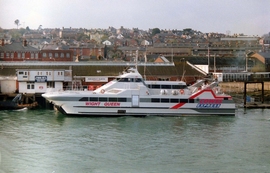 Picture of the surface effect ship (SES) Wight Queen at Cowes Thetis Wharf during the second attempt at the service in 1991